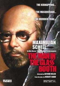     / The Man in the Glass Booth